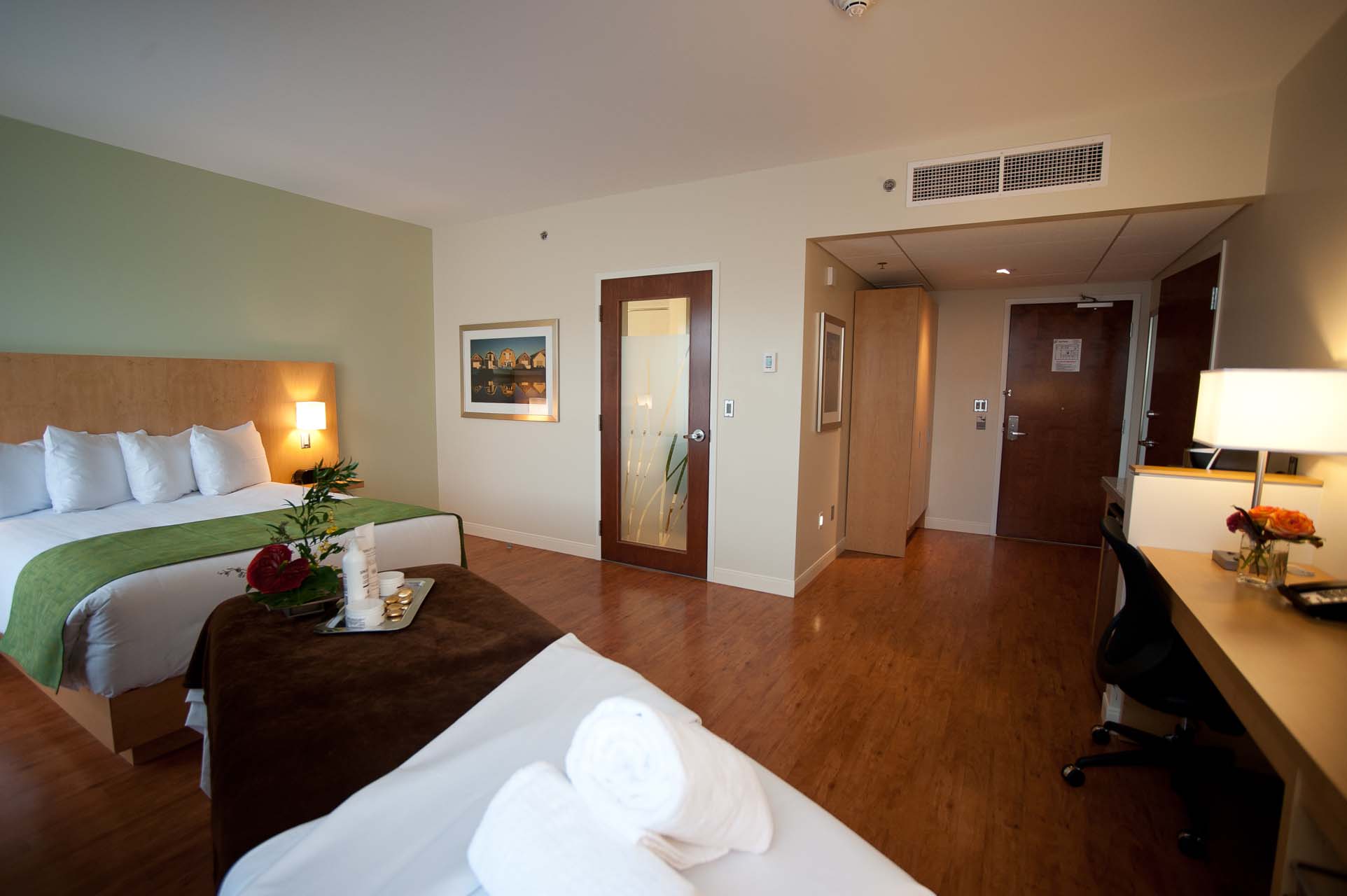 Accessible Queen room with a spa bed and work desk