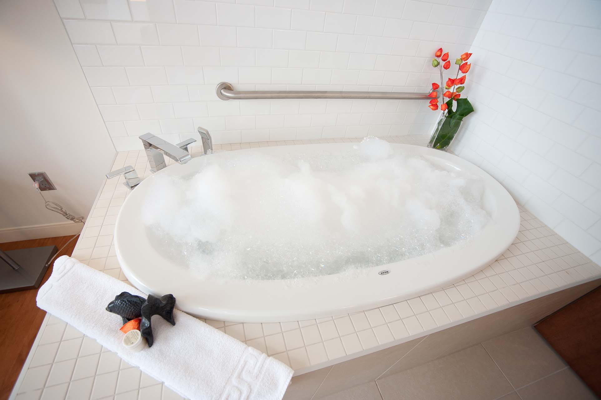 A bubble bath with grab bars