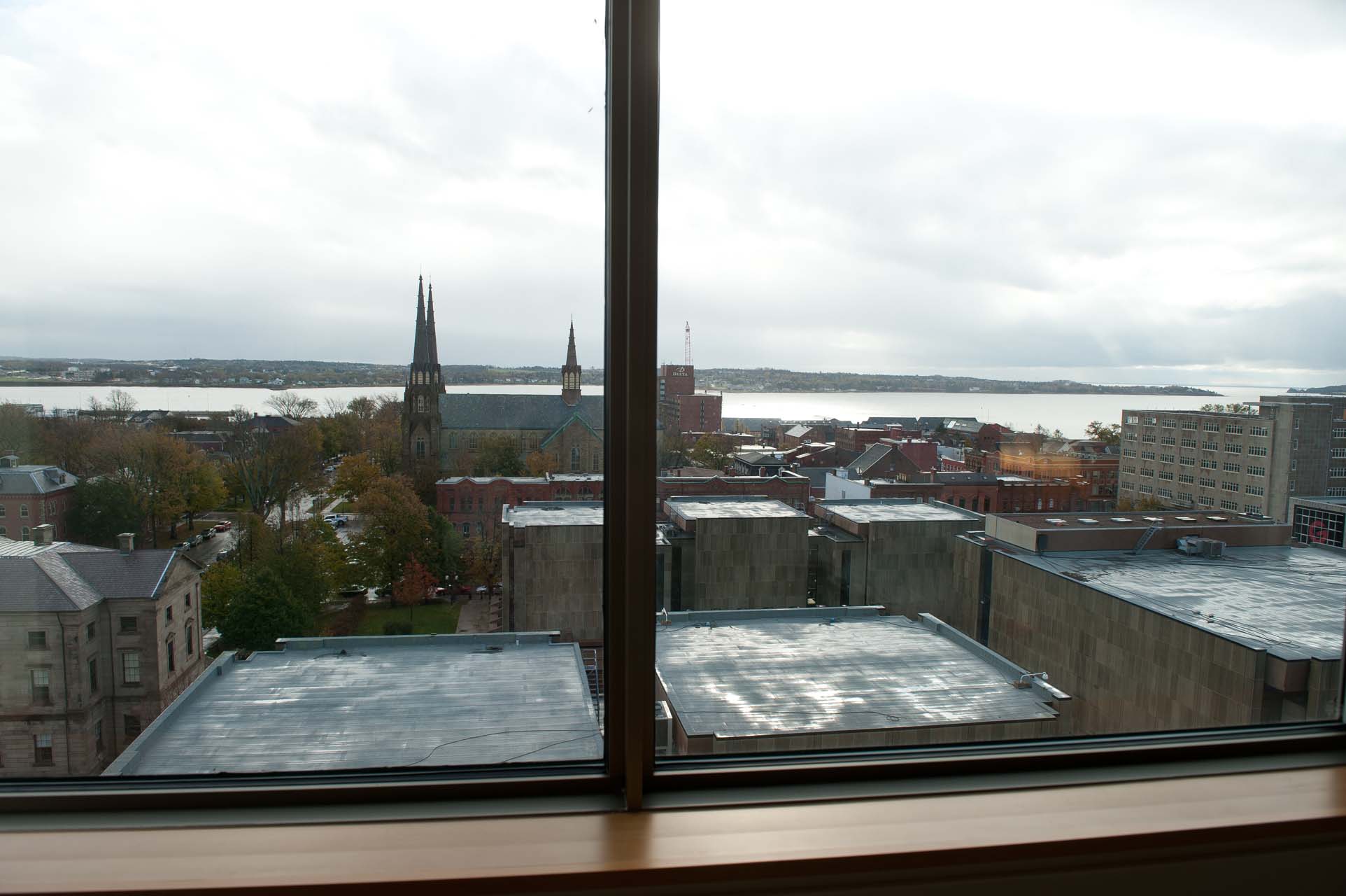 A window view of the city and the river